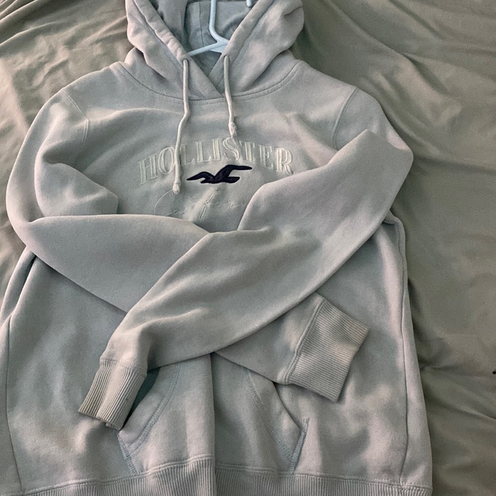 Light blue Hollister hoodie in pretty good condition (a few small stains)